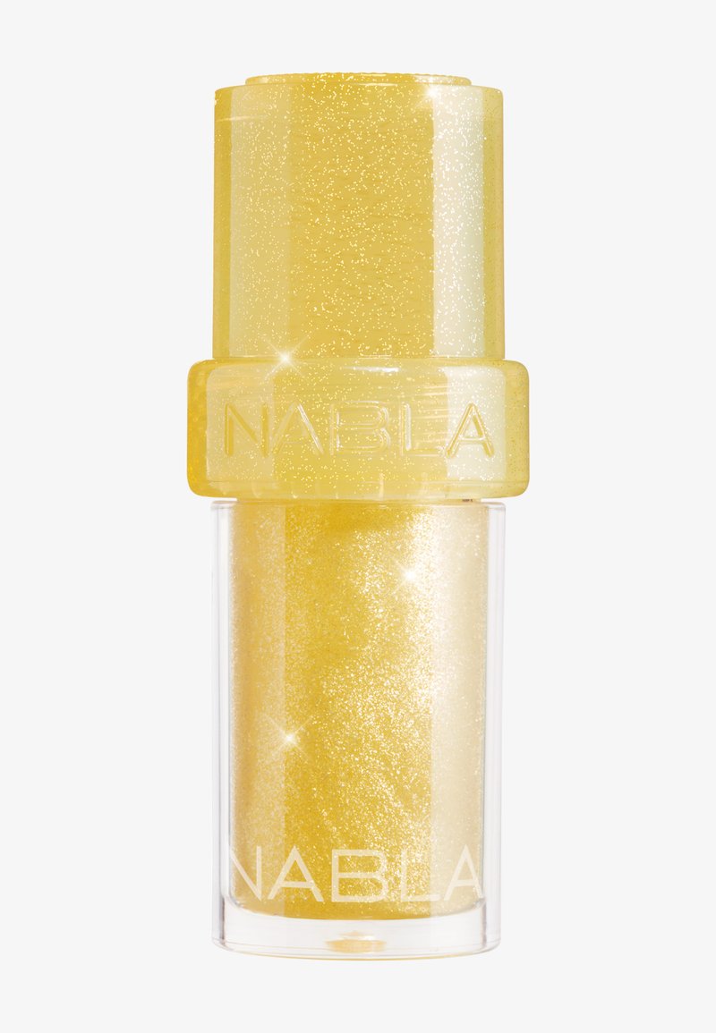 Gul glittertusj i stiftform med klar nedre beholder og hette preget med ordet "NABLA."