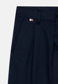 BOSS Kidswear TROUSERS - Auduma bikses - navy