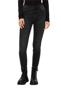 Svarta slim fit jeans med hög midja, som har bälteshällor, framfickor och subtila blekningar. Bärs med svarta snörda kängor.