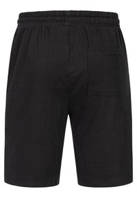 Zwarte katoenen shorts met een elastische tailleband, voorzien van een achterzak en een gladde textuur, ontworpen voor comfort en casual draagcomfort.