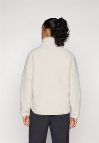 Jack Wolfskin HIGH CURL - Jakna od flisa - pale sand