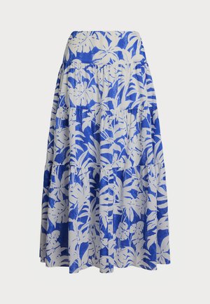 Saia em camadas azul e branca com padrão de folhas tropicais, cintura elástica e um design fluido feito de tecido leve.