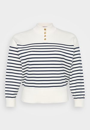 Pulover alb cu dungi orizontale bleumarin, gât fals, patru butoane aurii și manșete și tiv cu model în puncte. Material din amestec de bumbac.