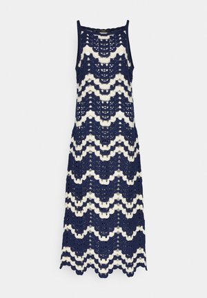 Čipkast pleteni obleki z mornarsko modrim in kremnim valovitim vzorcem, brez rokavov in z robom v obliki školjke. Lahka, zračna tkanina.