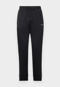LOGO TAPE PANT - Tracksuit bottoms - black