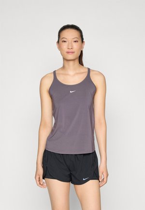 Sleeveless athletic tank top in dark gray, made of lightweight material, featuring a white Nike logo on the chest, paired with black shorts.