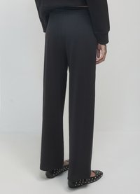 Calliope A PALAZZO IN - Jogginghose - ultrablack