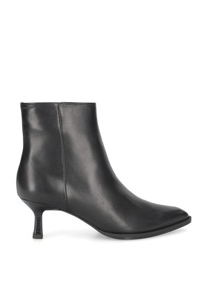 Black leather ankle boot with pointed toe and low kitten heel shown from side on white background.