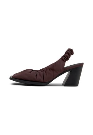 Brown ruched slingback shoe with pointed toe and chunky black mid-height heel, isolated on white background.
