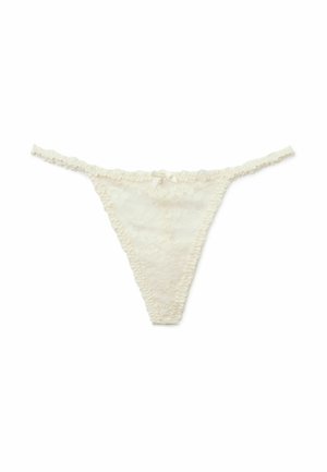 Tanga de encaje color crema con cintura delgada y fruncida y pequeño detalle de lazo centrado en la parte delantera de la cinturilla.