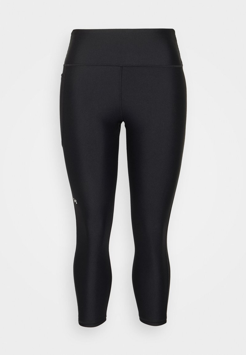 Schwarze Sportleggings aus dehnbarem Stoff. Hoher Taillenbund, enganliegendes Design mit einem Logodetail am linken Unterschenkel.