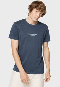 Kaotiko UNISEX EXPECT NOTHING - Camiseta estampada - navy blue