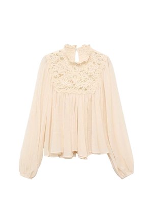 Light beige blouse with long puffed sleeves, ruffled neckline, and lace detailing at the chest; soft, flowing fabric with pleated design.