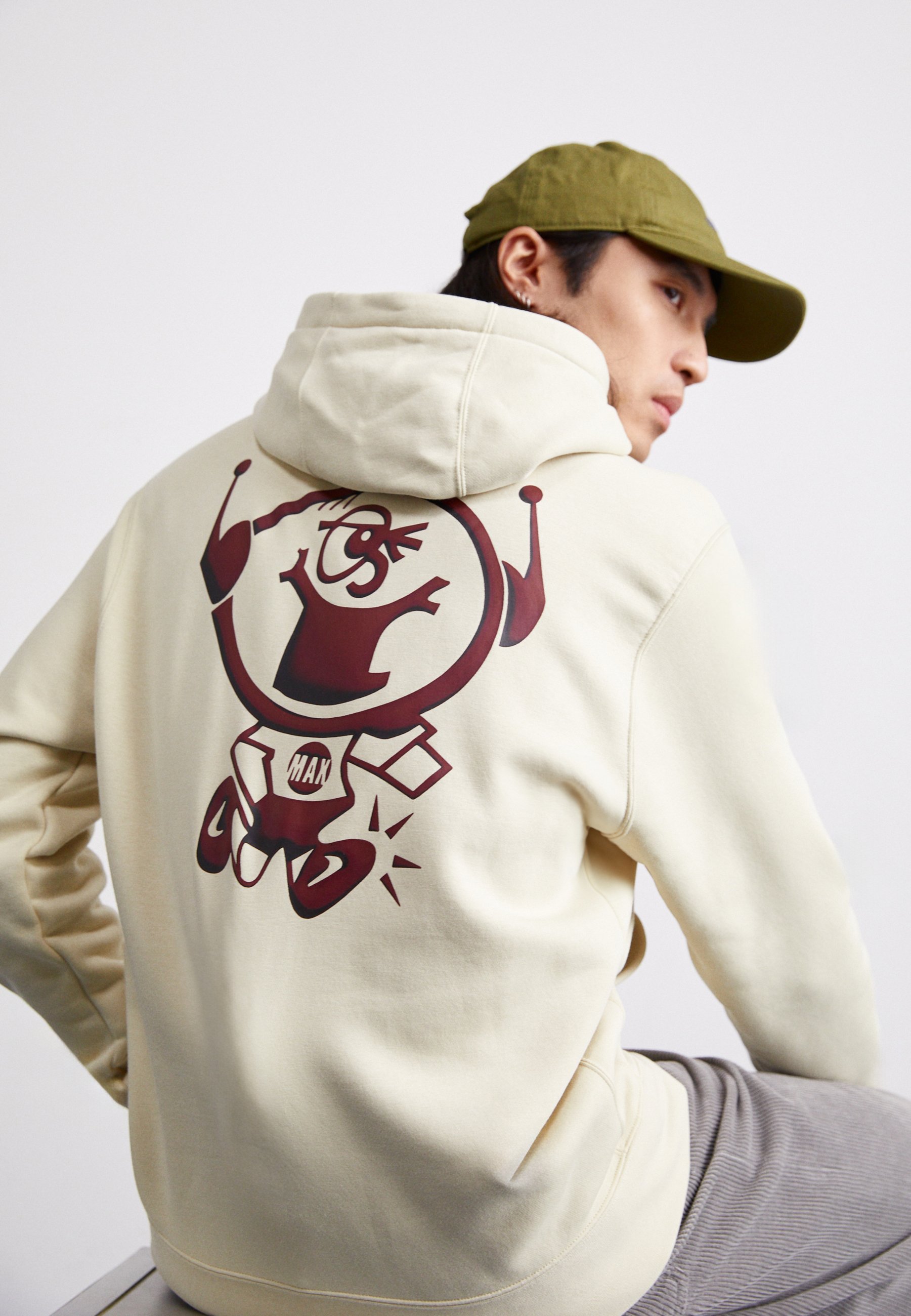 cream colored nike hoodie