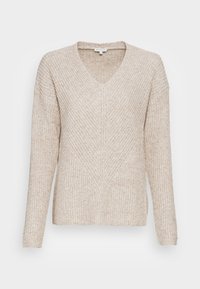 Pull en tricot beige avec col en V, manches longues et motif texturé. Présente une coupe décontractée et des détails de couture visibles.