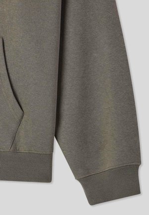 Felpa grigia con tessuto testurizzato, polsini a costine e tasca a marsupio. Il design presenta una vestibilità comoda e dettagli sui fianchi.