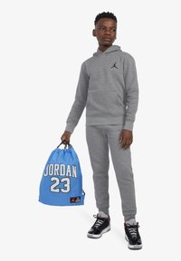 Jordan JAN GYM SACK UNISEX - Virvele užtraukiamas sportinis krepšys - university blue