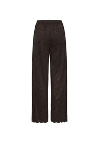 Juodos gėlėtos plačių kojų kelnės, pagamintos iš lengvo audinio. Savinasi elastinga juosmens juosta ir pagamintos su banguotu apačios kraštu.