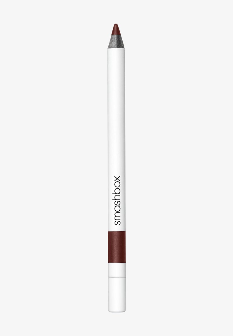 Huulilinerin kynä, jossa on valkoinen runko ja punainen kärki, hopeinen pää. Brändin nimi "smashbox" on mustalla tekstillä sivussa.