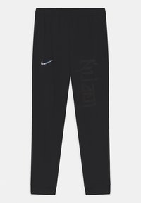 Schwarze Sporthosen mit elastischem Bund, Seitentaschen, reflektierendem Nike-Swoosh am linken Oberschenkel und dezenten vertikalen Schriftzügen am rechten Bein.