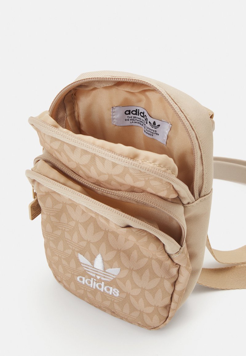 Adidas Mono Beige Adidas Originals MONO FEST BAG UNISEX Olkalaukku