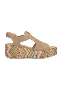 Sandale compensée beige à bout ouvert avec bride élastique à la cheville et semelle plateforme multicolore à motif zigzag.