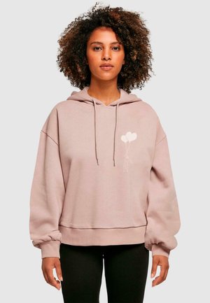 Light pink hoodie with a relaxed fit, drawstring hood, and balloon graphic on the chest. Features ribbed cuffs and waistband.