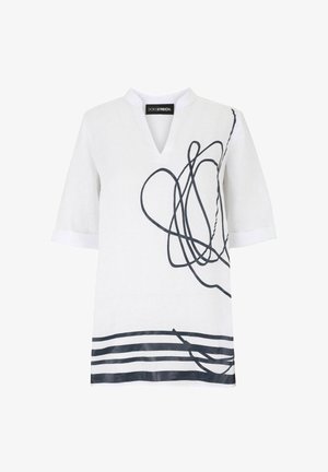 White short-sleeve V-neck shirt with black abstract squiggle design on right side and horizontal stripes at bottom hem.