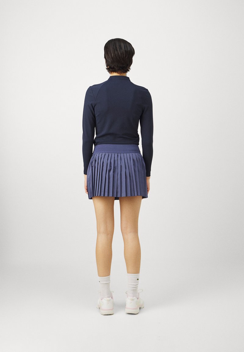 HerGymClothing Jupes de tennis taille haute pour femme avec short
