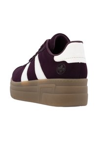 Plum suede sneaker with white stripes, elevated platform sole, round toe, and textured rubber outsole. Side logo detail present.