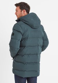 Dark green puffer jacket with a hood, featuring horizontal quilted sections, a zip closure, and an adjustable waist, made from a smooth material.