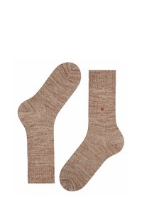 Calzini marroni con texture, caratterizzati da un motivo marmorizzato, di lunghezza crew, e un piccolo punto rosso su un calzino.