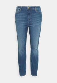 Ciemnoniebieskie dżinsy o wąskim kroju, z pięcioma kieszeniami, z zapięciem na guzik oraz delikatnym wyblaknięciem w okolicy ud i kolan.