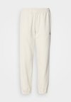 MONOLOGO - Calças de fato de treino - vanilla heather