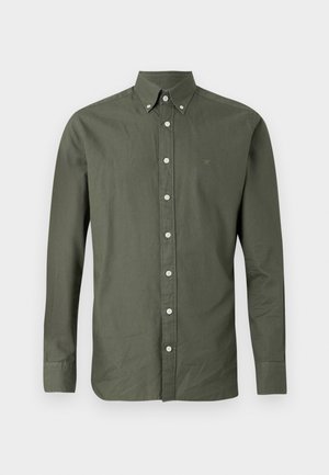 Olive green long-sleeve button-up shirt with a pointed collar, featuring white buttons and a small emblem embroidered on the chest.