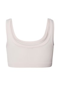 Ljusbeige sömlös crop top med rundad halsringning. Mjuk textur och breda axelband, designad för komfort och enkel användning. Inga synliga stängningar.