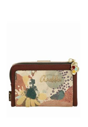 Cartera con patrones florales abstractos multicolor, ribete marrón, logotipo dorado de Anekke y charm en forma de flor para el tirador de la cremallera.