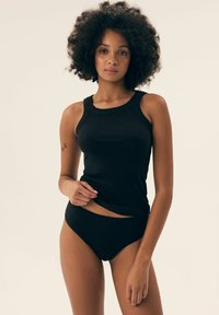 Black ribbed tank top with wide shoulder straps and high-cut black briefs, both made from a smooth, stretchy fabric.