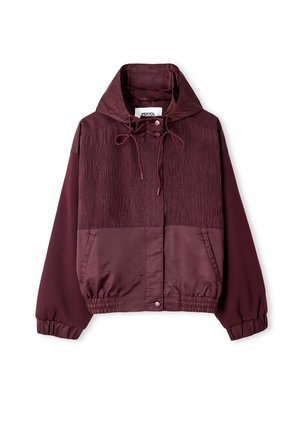 Burgundy hooded jacket featuring a textured upper section, elastic cuffs, and waistband, with two side pockets and drawstrings.