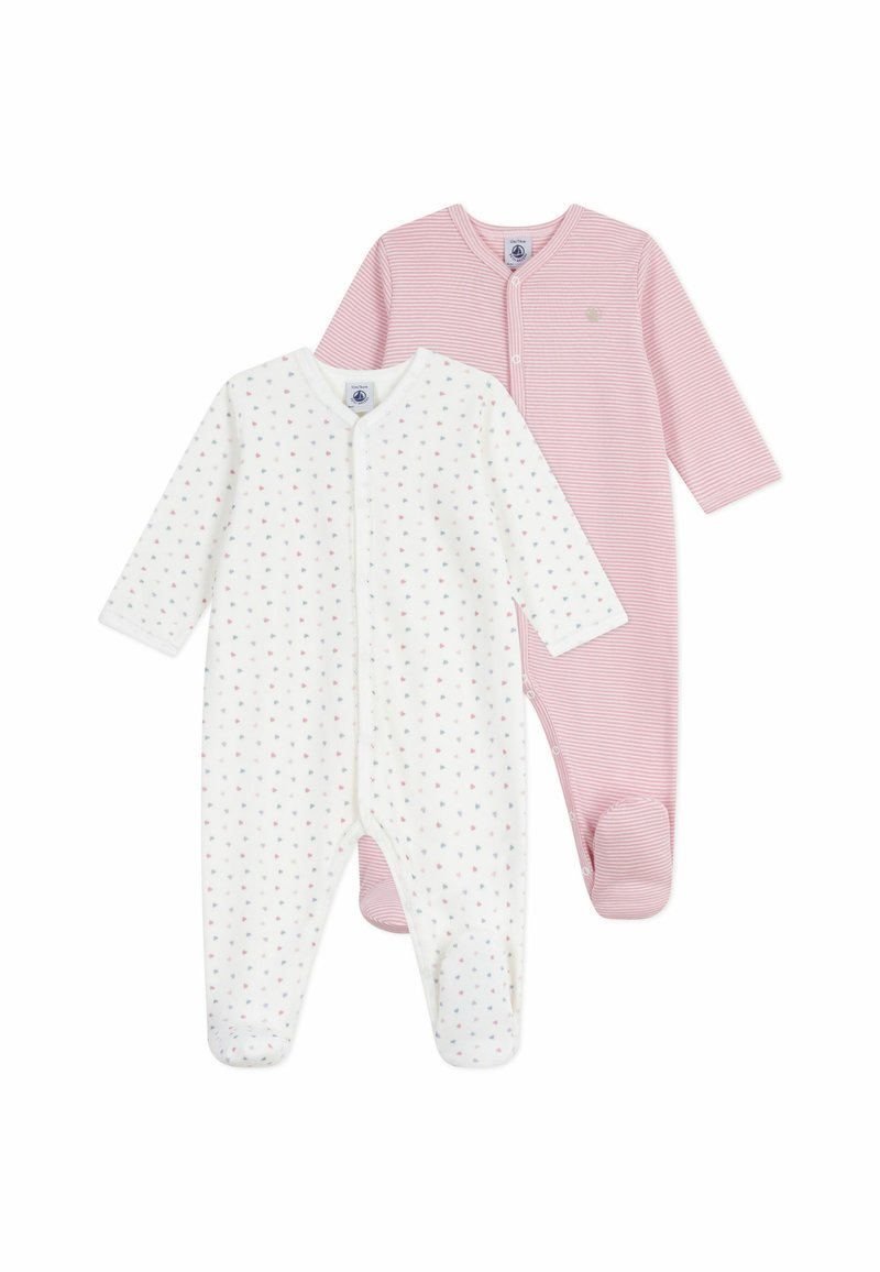 Set med två babyjumpers: en vit med flerfärgade prickar och en rosa med vertikala ränder. Båda har långa ärmar och fötter.