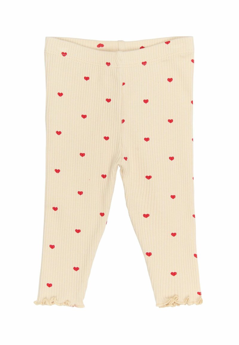 Ráncos leggings krém színben, szórt piros szív mintákkal; a bokáknál fodros szegőkkel.