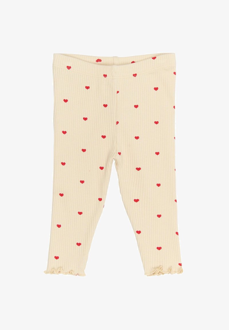 Ráncos leggings krém színben, szórt piros szív mintákkal; a bokáknál fodros szegőkkel.
