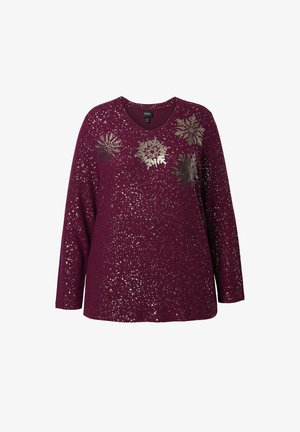 Burgunderfarbenes Langarmoberteil mit V-Ausschnitt, verziert mit silbernen Schneeflockenmuster und verstreuten metallischen Akzenten auf einem strukturierten Stoff.