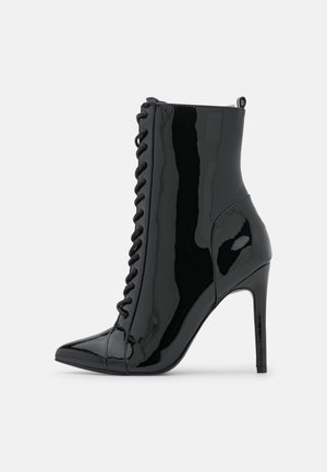 Enkellaarsjes met hoge hak - black