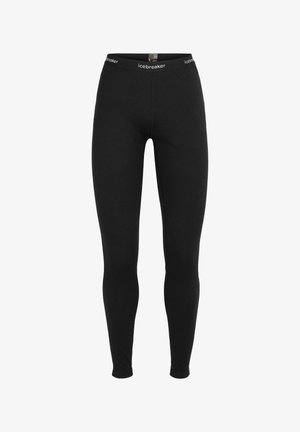 Black leggings made of a stretchy fabric, featuring a fitted design and a waistband with the "icebreaker" logo. Smooth texture overall.