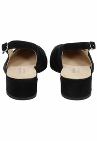 Chaussures à talons blocs en suede noir avec une bandoulière arrière et un détail de boucle, dotées d'un bout arrondi et d'une doublure intérieure lisse.