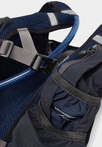 Navy blue hydration backpack with gray straps, mesh texture, a transparent drinking tube, and a zippered compartment. "Swedemount" label visible.