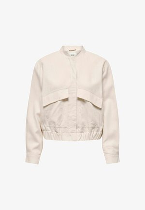 Kort, lys beige jakke laget av myk stoff, med ståendekrage, elastisk midje og to store frontlommer.