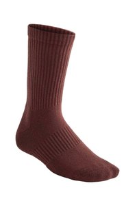 Calzino in cotone color bordeaux con trama a coste. Presenta una lunghezza fino a metà polpaccio, tallone rinforzato e punta senza cuciture per comfort e vestibilità.