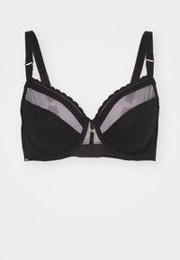 Black bra with sheer mesh and textured lace cups, scalloped edging, adjustable straps, and gold-tone hardware detail at center.